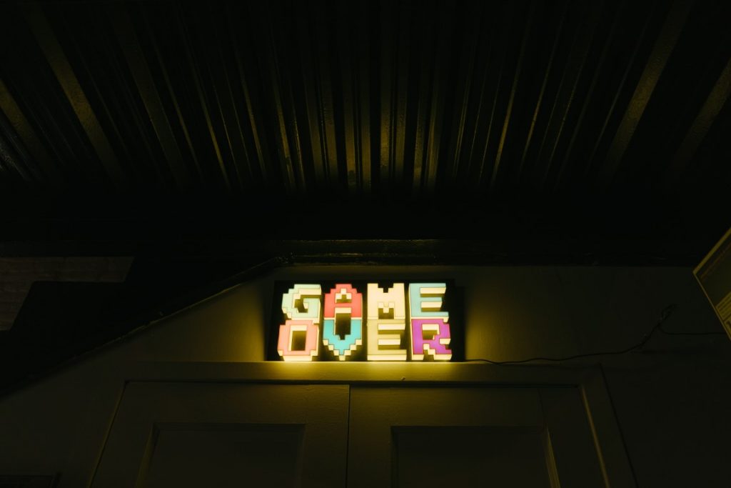 game over lit up on a sign